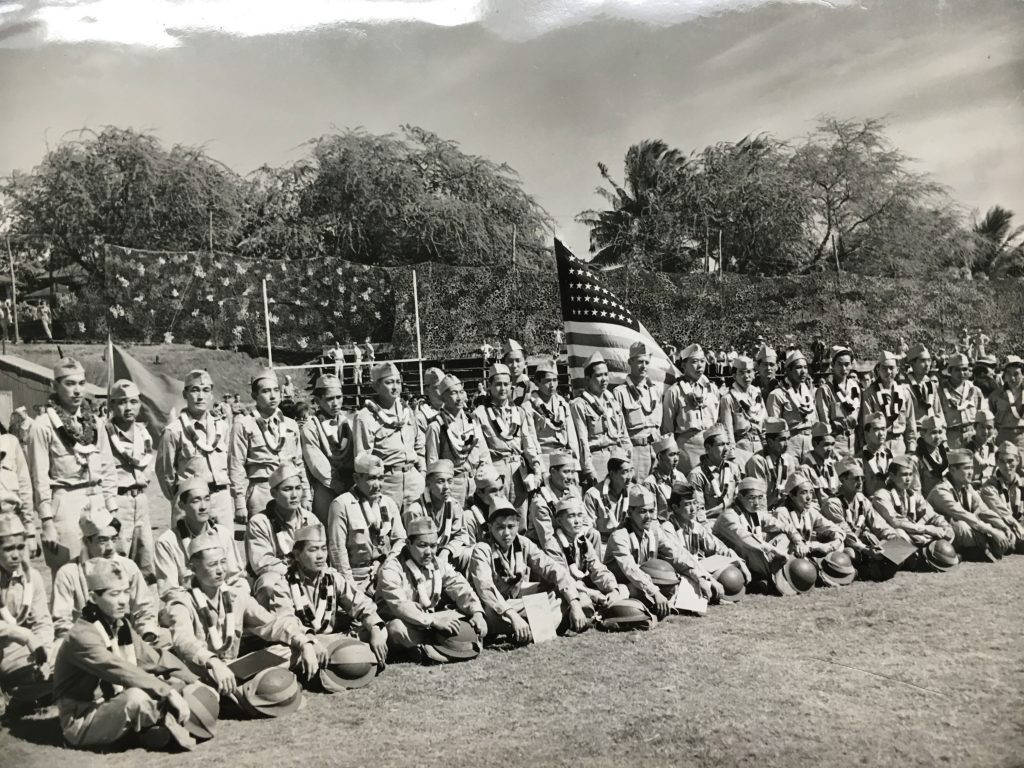 Japanese American volunteers pose for a photo in Aiea, Oahu, after being accepted by the U.S. Army. Photo courtesy of Hawaii State Archives.